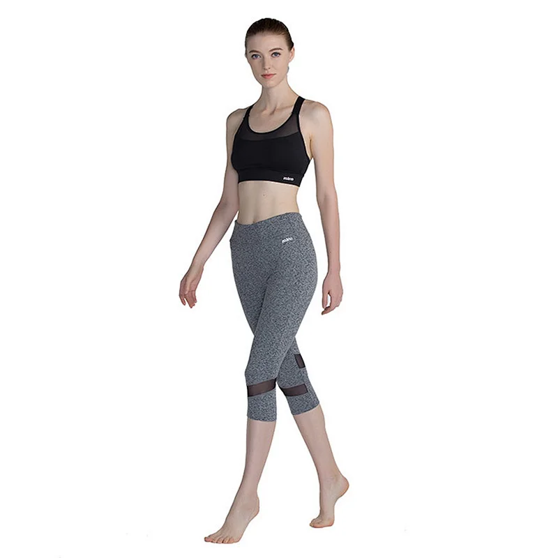 Wholesale customized women's polyester and spandex mesh breathable 3/4 length yoga gym leggings