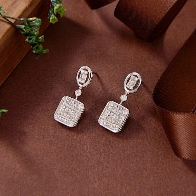 silver huggies earrings