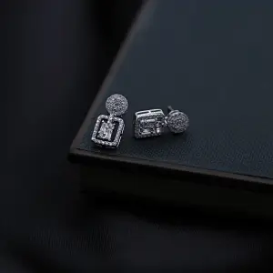 interlocking g earrings in silver
