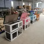 Two-story wooden rabbit hutch