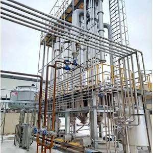 Falling film vacuum evaporator