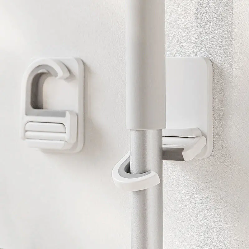 Powerful and seamless Wall Hook Mop and Broom Organizer Home Storage Rack