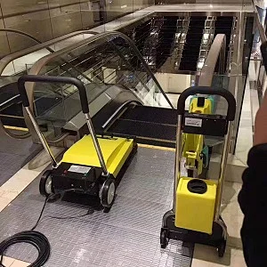 HOW DO YOU CLEAN AN ESCALATOR HANDRAIL?