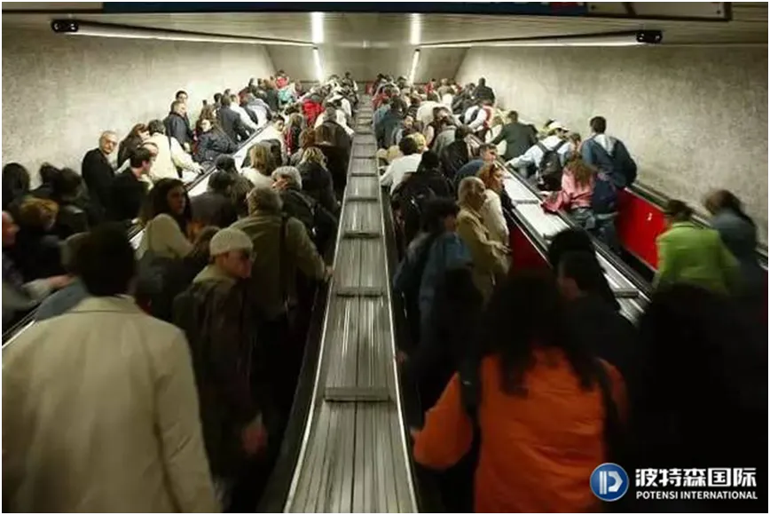 crowds in the escalator in subway
