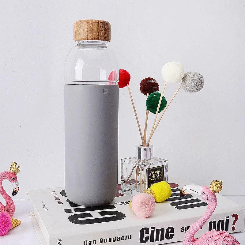 new design borosilicate bpa free 500 ml silicone glass bottle bamboo lid bottle
