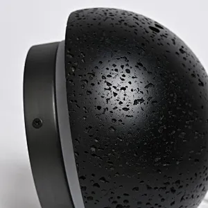 Solar eclipse natural black travertine stone wall light