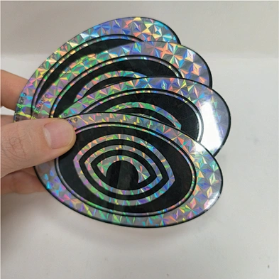 Waterproof Glossy Shiny Overlay Hologram Sticker Label PVC Shiny Stickers -  China Shiny Stickers, PVC Shiny Stickers