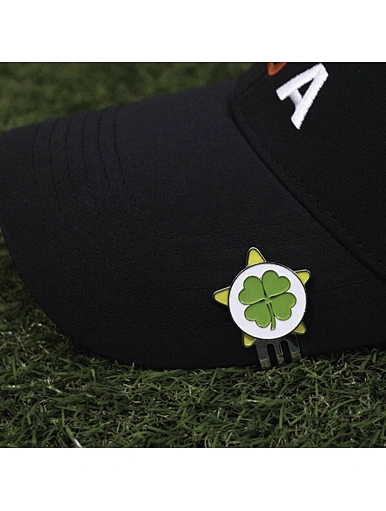 This women's ball marker hat clip is both functional and fashionable. It comfortably attaches to the brim of a hat, providing easy access to a ball marker during a round of golf. The clip features a colorful design and is made with durable materials.