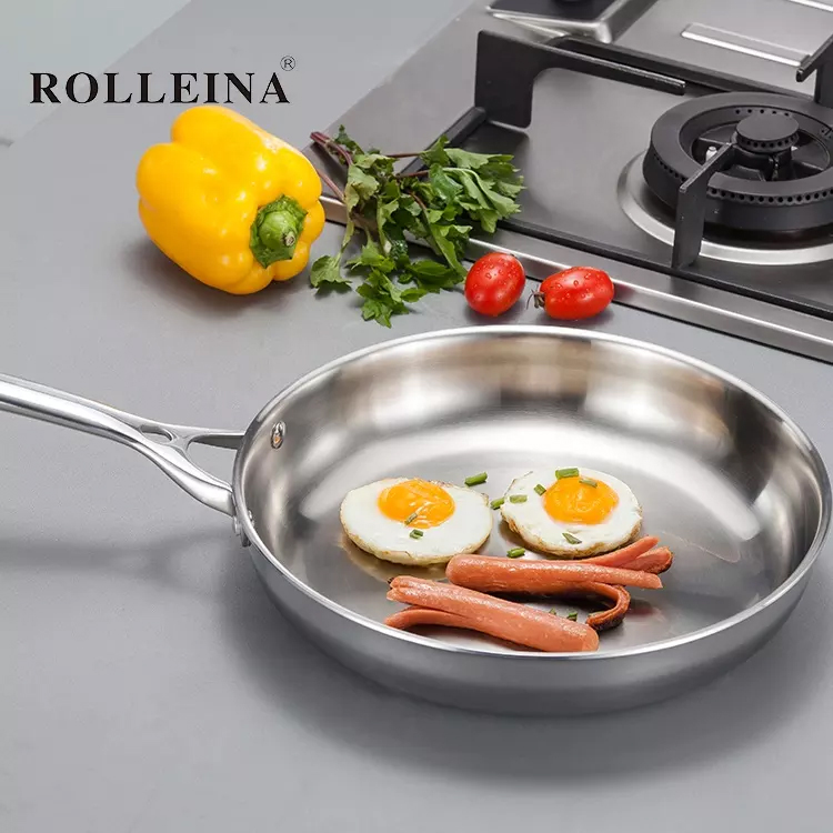 Tri-ply clad stainless steel frying pan